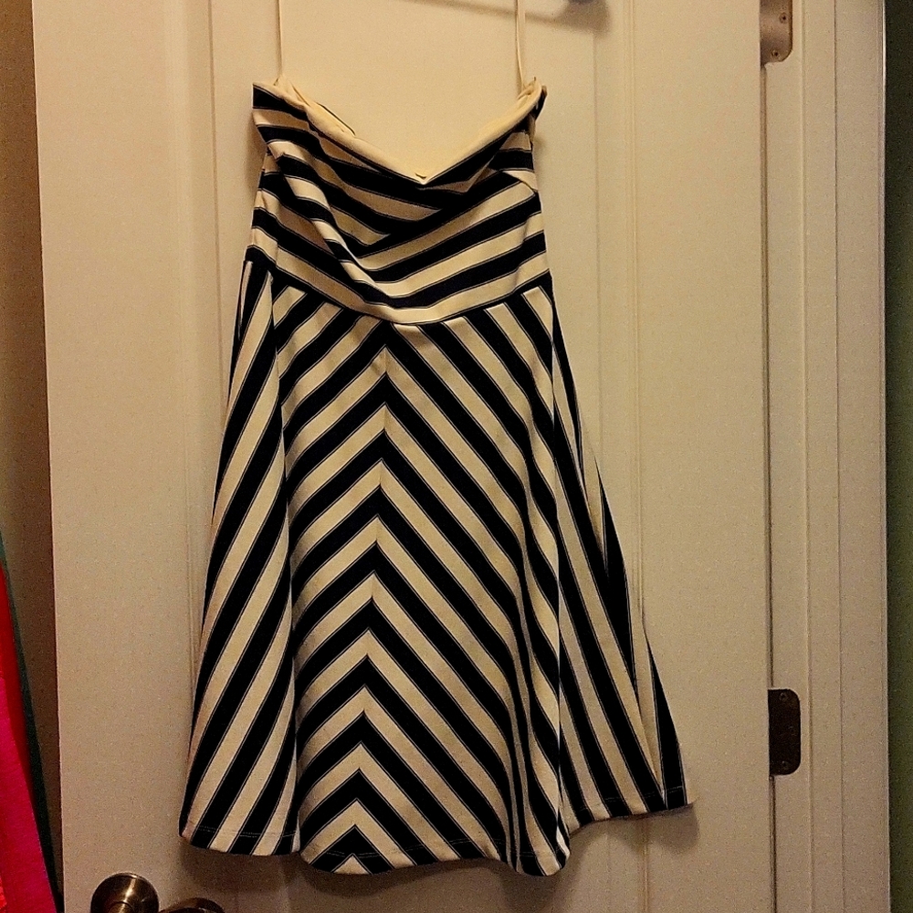 The limited strapless dress